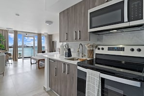 Studio Standard - utsikt mot stranden | Eget kök | Stort kylskÄp, mikrovÄgsugn, spishÀll och espressobryggare