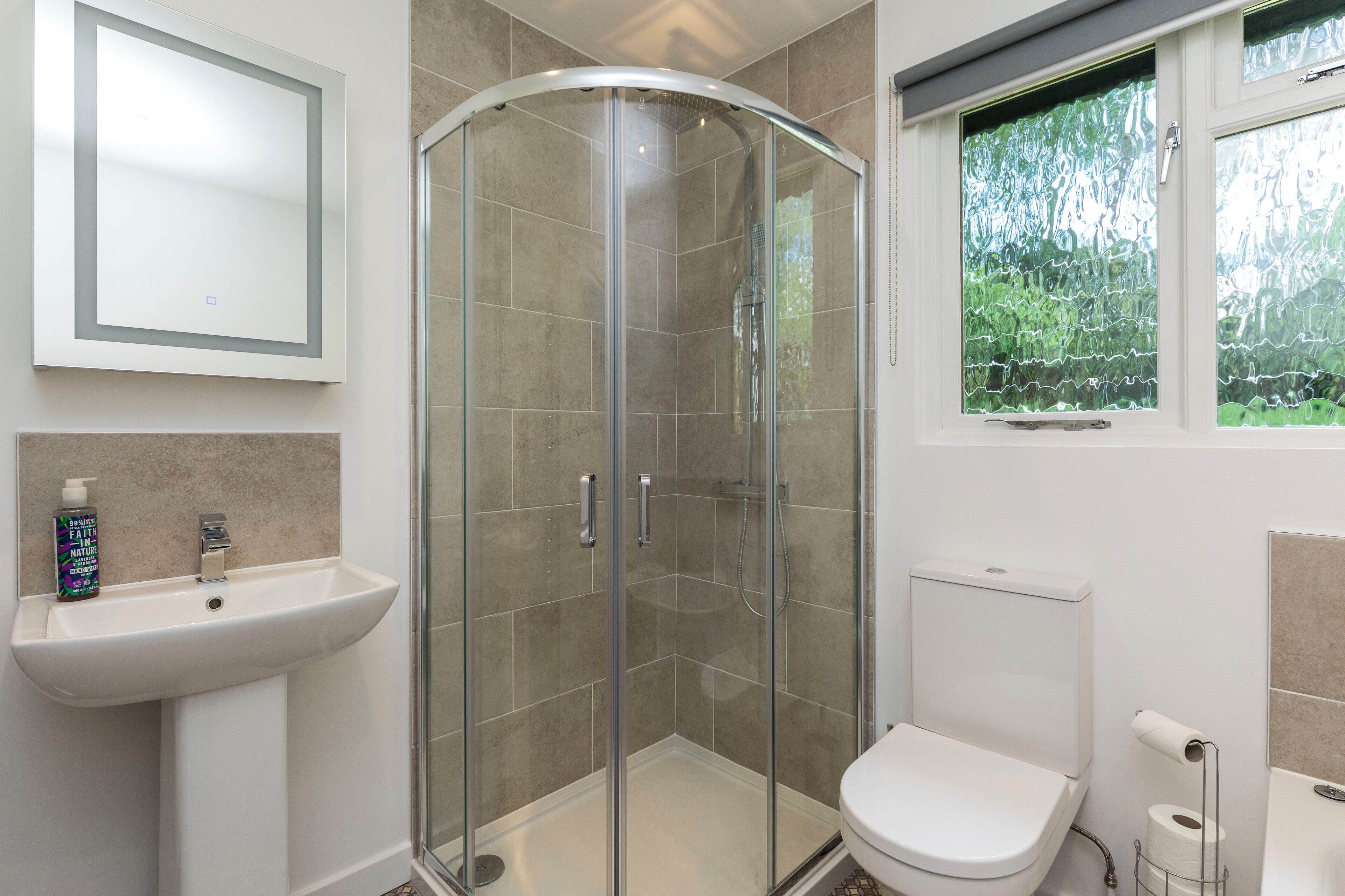 Shower, eco-friendly toiletries, hair dryer, towels