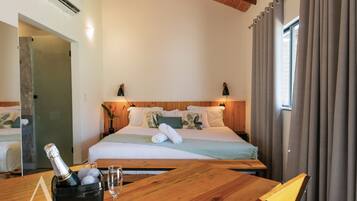 Suite Deluxe, hidromasaje | Camas con pillow-top, minibar, cortinas blackout y insonorización