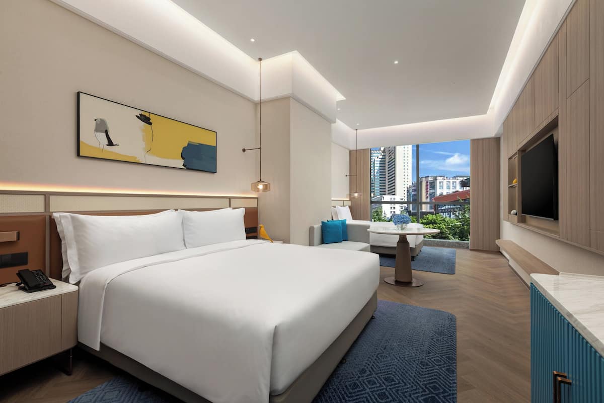 Premium-huone, 1 suuri parisänky | Ylelliset vuodevaatteet, untuvapeitot, ilmaiset minibaarituotteet