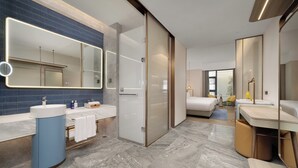 A modern bathroom with a large mirror, two sinks, and a shower area. - voco Chengdu Chunxi Road by IHG (Chengdu)