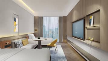 Seprai premium, selimut bulu angsa, dan minibar gratis