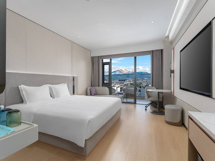 Down duvets, desk, laptop workspace, blackout curtains