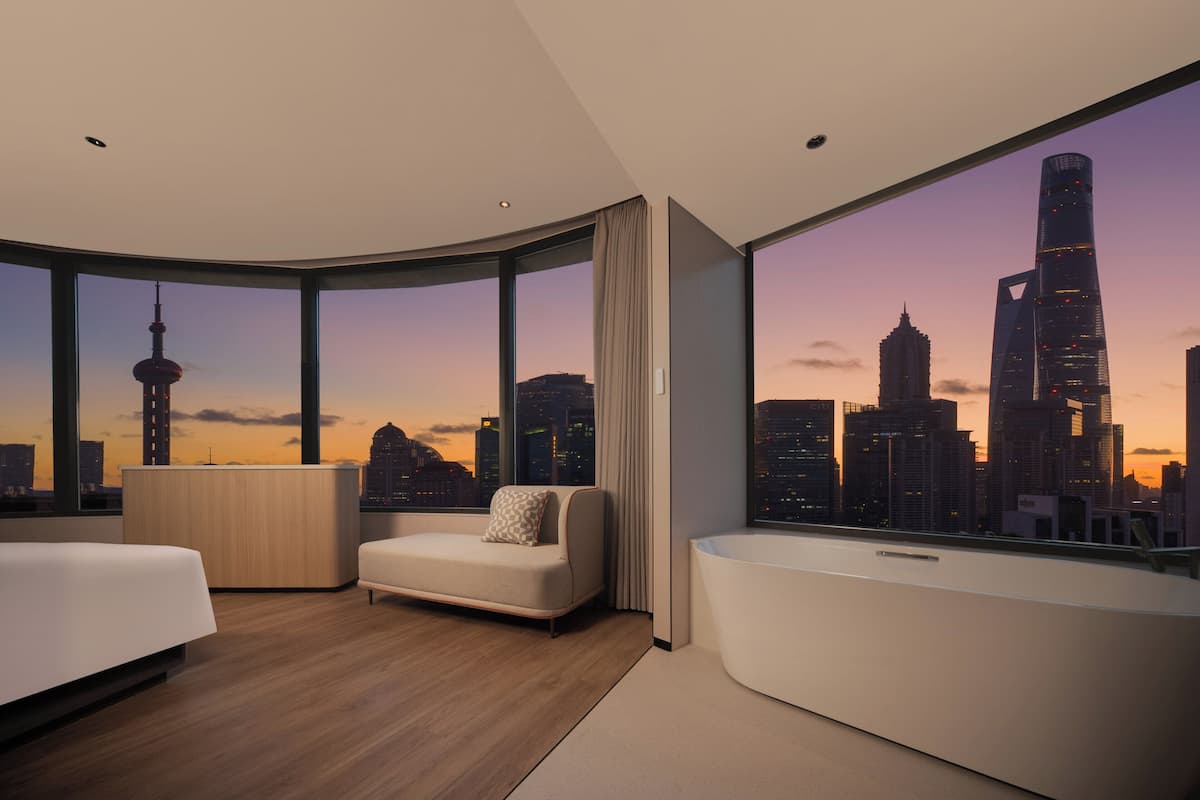 1 King Bed Extra Floor Space City View | Premium bedding, down comforters, laptop workspace, blackout drapes