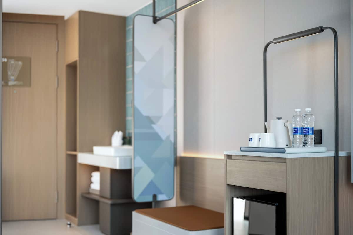 1 King Standard City View | Premium bedding, down comforters, laptop workspace, blackout drapes