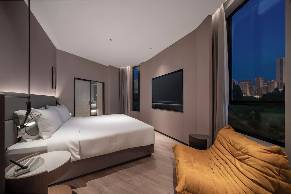 Suite, 1 Bedroom, City View | Premium bedding, down comforters, laptop workspace, blackout drapes