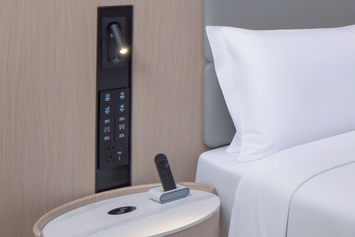 Premium bedding, down duvets, laptop workspace, blackout curtains