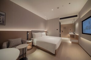 Premium bedding, down comforters, laptop workspace, blackout drapes