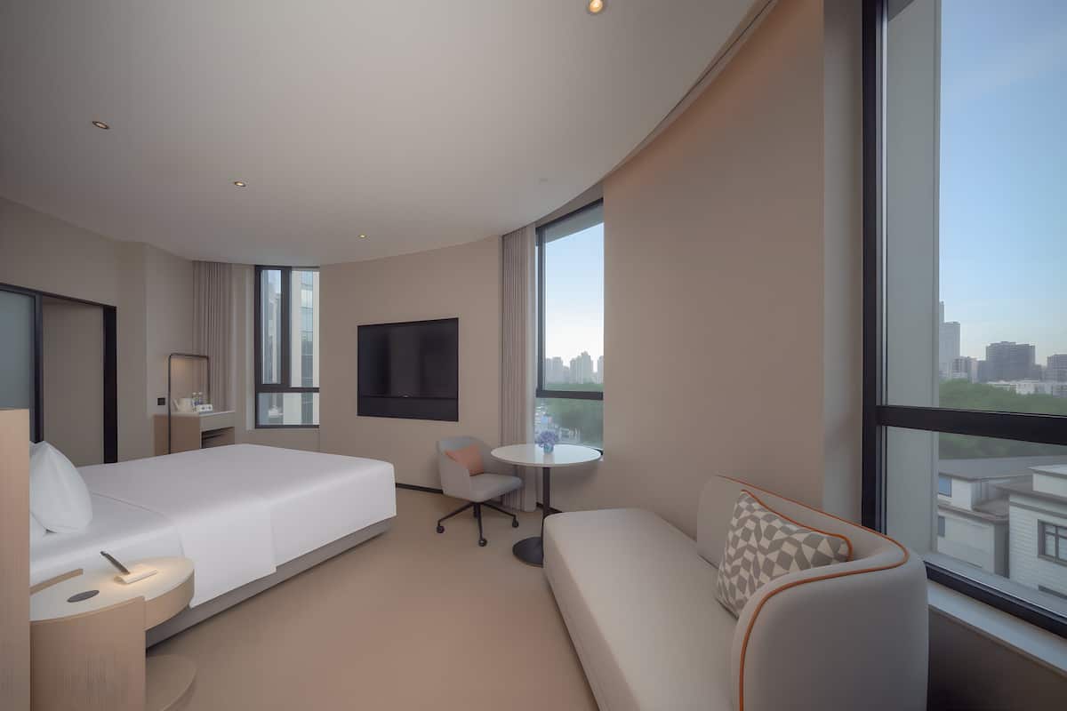 1 Bedroom Suite City View | Premium bedding, down comforters, laptop workspace, blackout drapes
