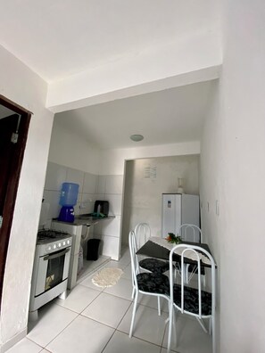 Economy Apartment | Private kitchen | Fridge