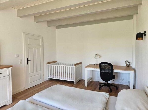 2 bedrooms, desk, iron/ironing board, travel crib