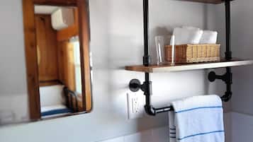 Combined shower/tub, hair dryer, towels, soap