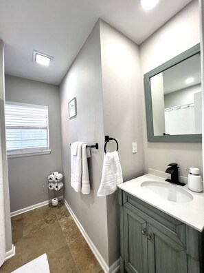 Hair dryer, towels, soap, shampoo