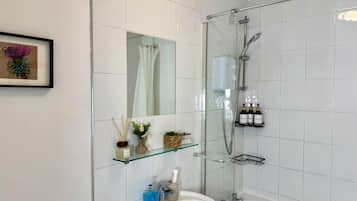 Bidet, towels, toilet paper