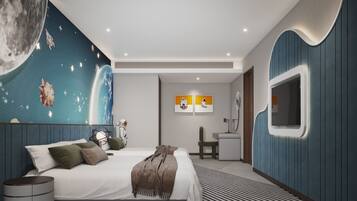 A modern bedroom with a bed, wall art, and a unique curved wall design.