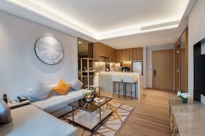1 Bedroom Living Apartment, M Club | Living area | 43-cm LCD TV with cable channels