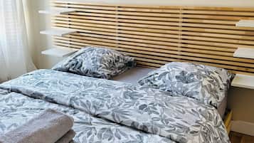 1 bedroom, desk, iron/ironing board, travel crib