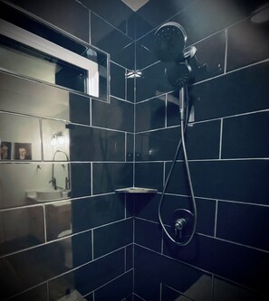 Shower, hair dryer, towels, toilet paper