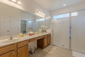 Shower, hair dryer, towels