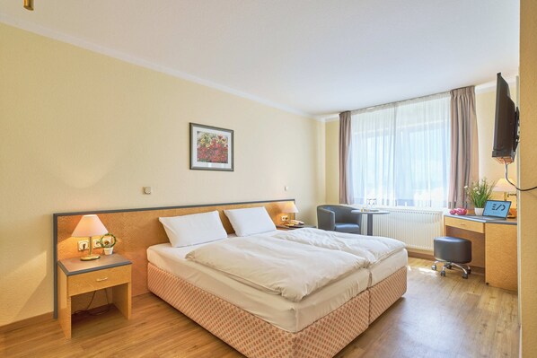 Desk, laptop workspace, blackout curtains, iron/ironing board