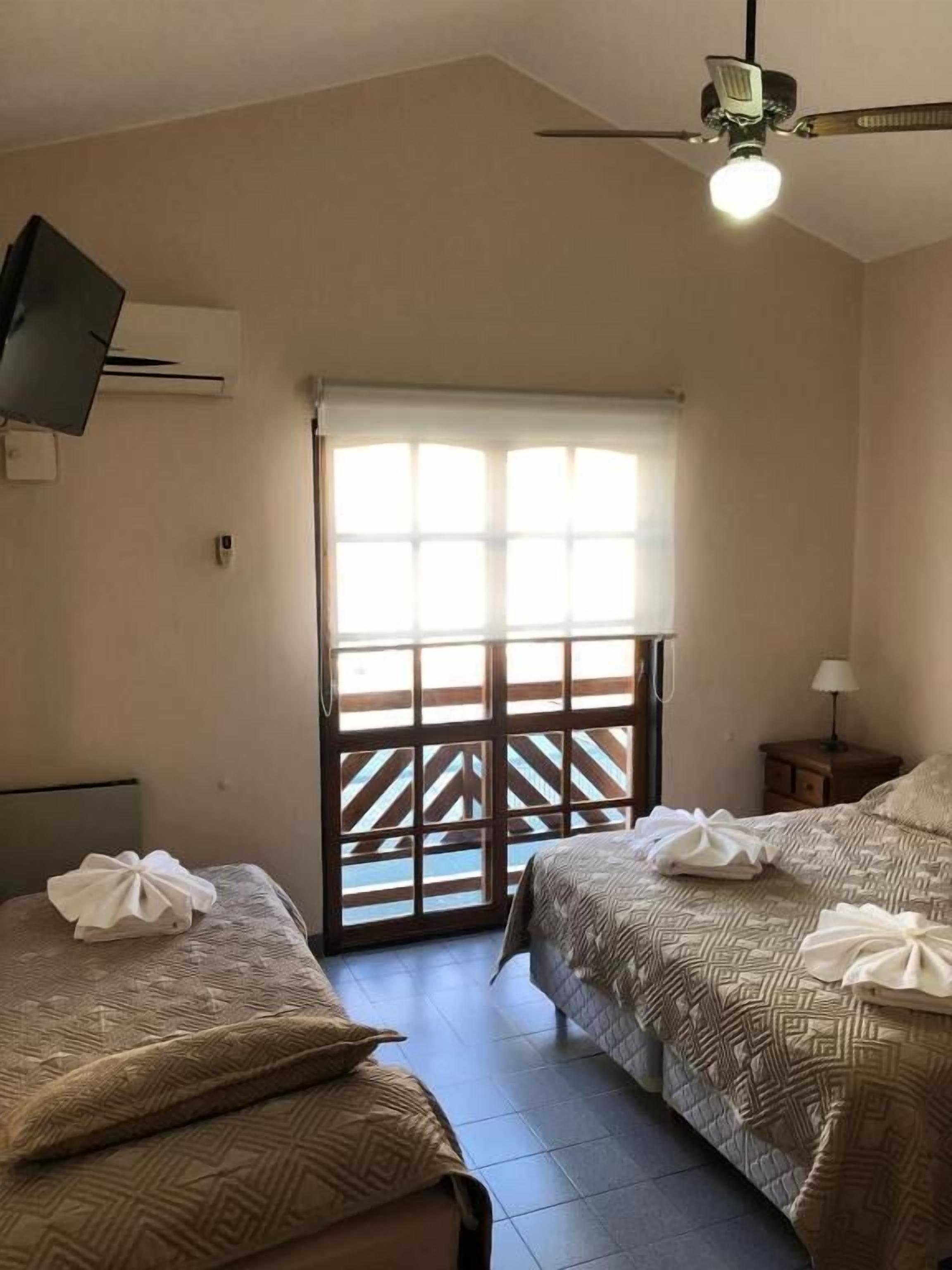 Triple Room | In-room safe, blackout drapes, iron/ironing board, free WiFi
