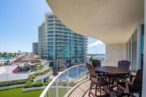 Outdoor dining - Four Bedroom Condo with Panoramic Views and Large Wraparound Balcony. Complimentary Boat Slip! (Orange Beach)