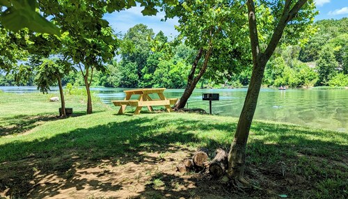 Primitive Riverside Camping with picnic table, from, and pet friendly