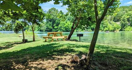 Primitive Riverside Camping with picnic table, from, and pet friendly