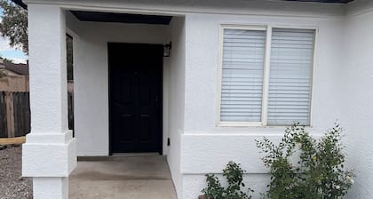 Modern Tesla Smart Home in Albuquerque – Solar Roof & EV Charging