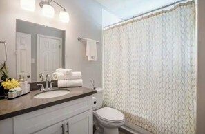 Eco-friendly toiletries, hair dryer, towels, soap