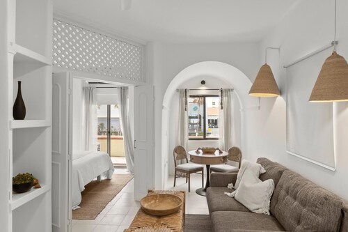 Beautiful designer condo across from beach, shops and restaurants!