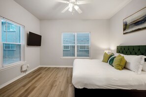 1 bedroom, desk, iron/ironing board, travel crib