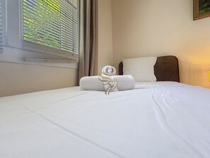 2 habitaciones, tabla de planchar con plancha y wifi gratis