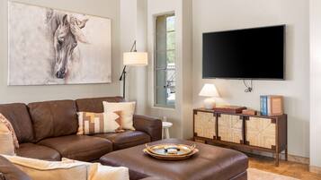 Smart TV, mesa de ping pong, libros