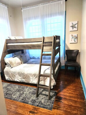 Iron/ironing board, travel crib, free WiFi, bed sheets