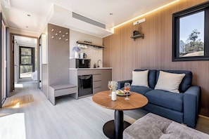Two-Bedroom Queen Cabin | Living area | 0-inch flat-screen TV with digital channels, Netflix, streaming services - Aravina Escapes (Yallingup)