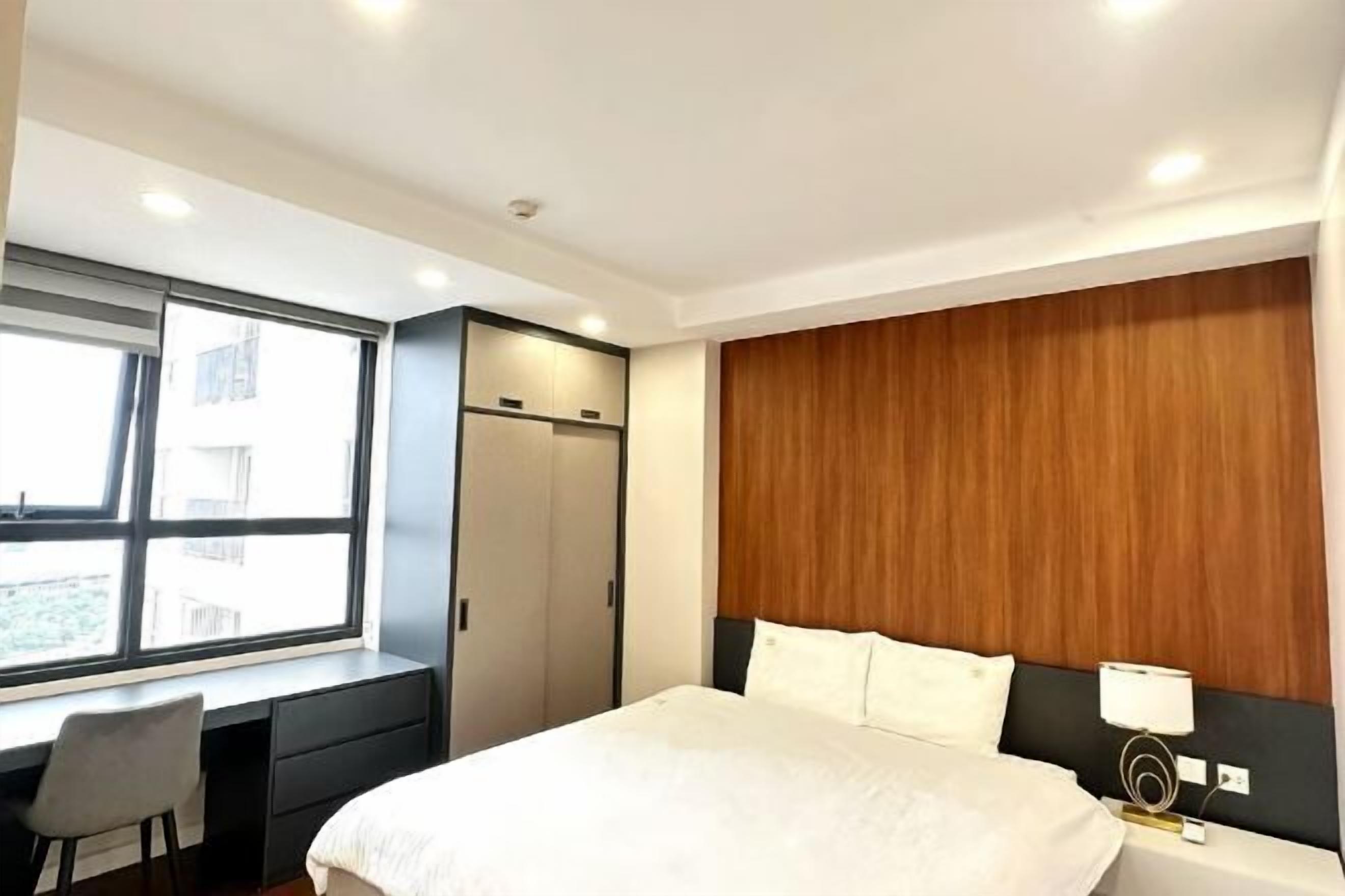 Desk, laptop workspace, blackout drapes, soundproofing