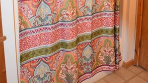 A shower curtain with a paisley pattern.