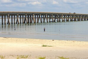 On the beach, sun-loungers, beach towels