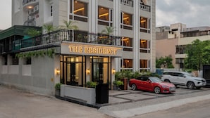 A multi-story hotel with balconies and a sign reading "THE RESIDENCY". - The Residency - A Boutique Hotel (Jodhpur)