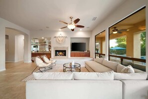 TV, fireplace, books, offices