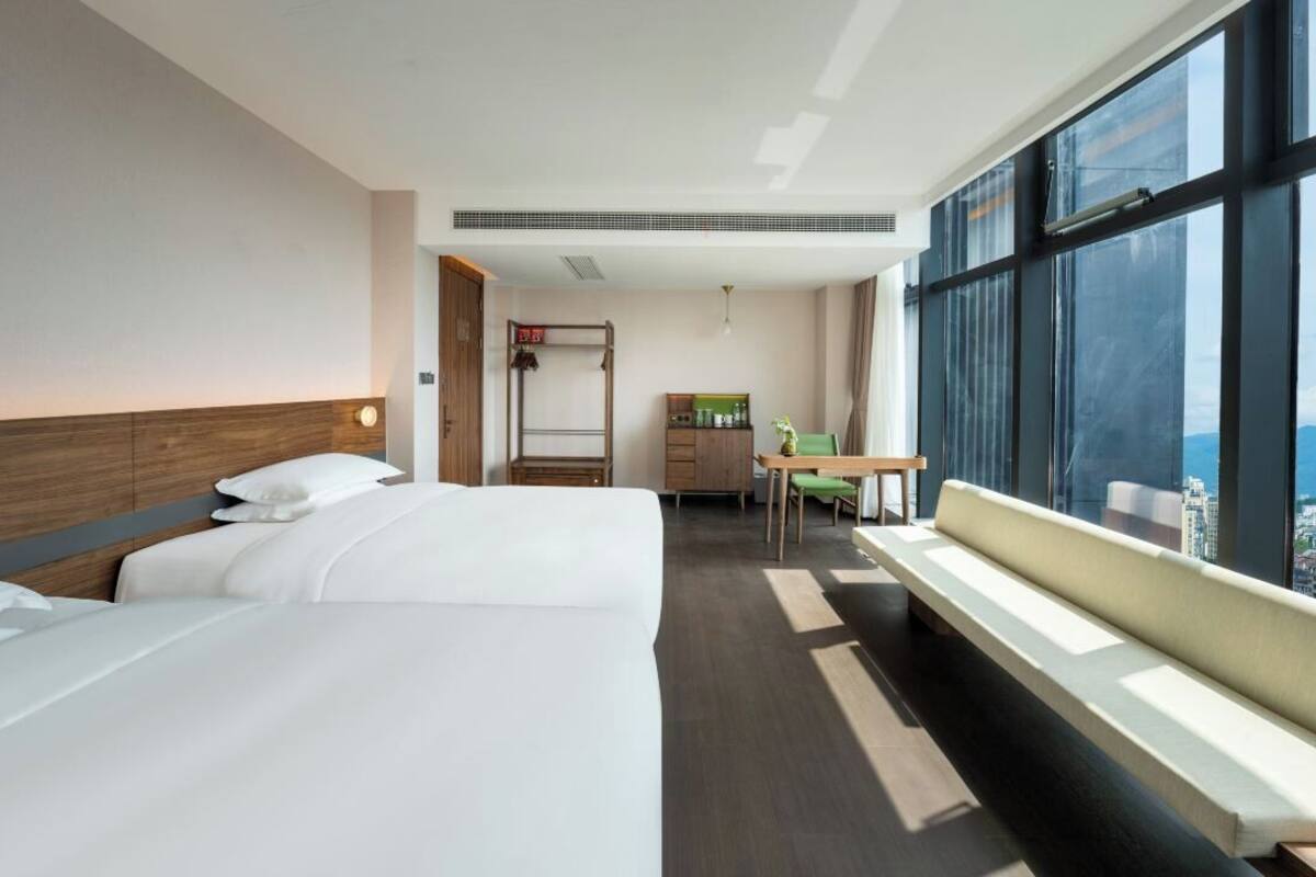 Family Twin Room, City View | Blackout drapes, soundproofing, iron/ironing board, free WiFi