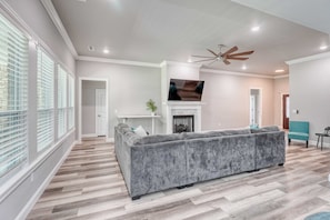 TV, fireplace, books, offices