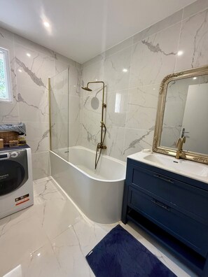 Hair dryer, bidet, towels, soap