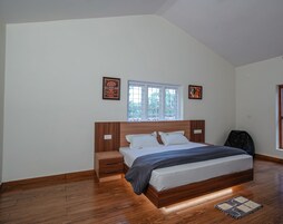 Family Suite, Balcony, Garden View | Desk, laptop workspace, iron/ironing board, free WiFi