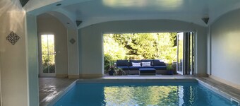 Rural farm stay- apartment with indoor heated swimming pool, terrace and garden