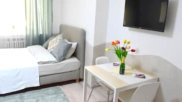 1 habitación, tabla de planchar con plancha, wifi y ropa de cama