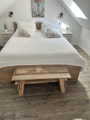 4 slaapkamers, een strijkplank/strijkijzer, beddengoed
