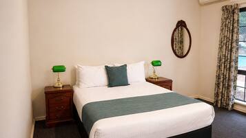 Desk, laptop workspace, iron/ironing board, cots/infant beds