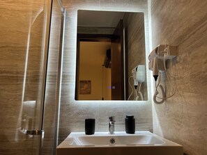 Hair dryer, towels, soap, toilet paper